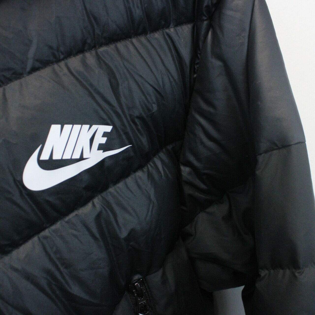 Nike black small outlet logo padded jacket