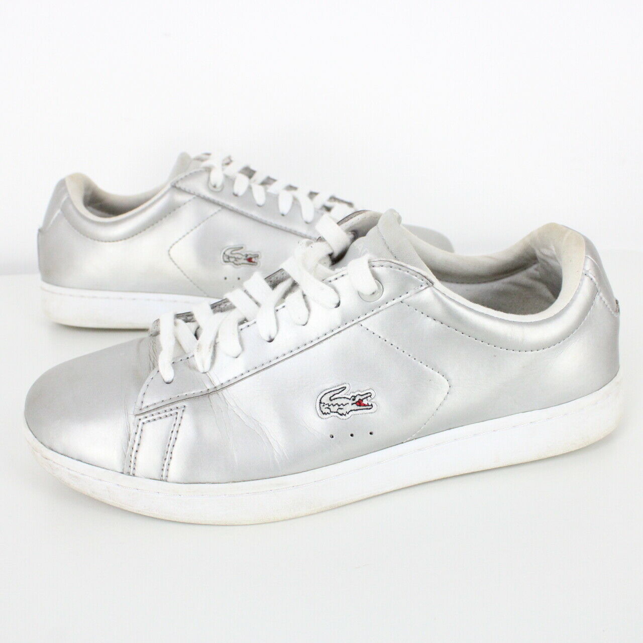 Lacoste store silver trainers